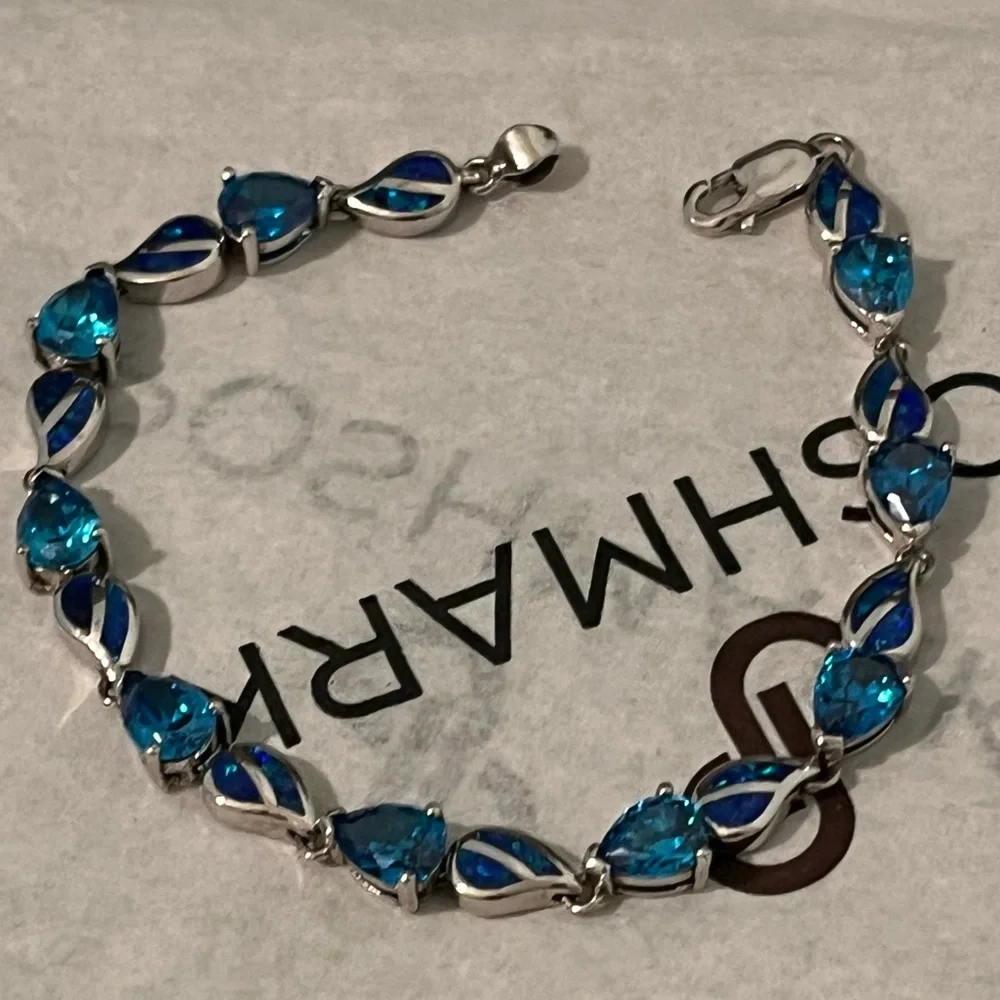 LOVED AUTHENTIC LONDON BLUE TOPAZ STONES/BLUE FIRE OPAL STERLING SILVER BRACELET
